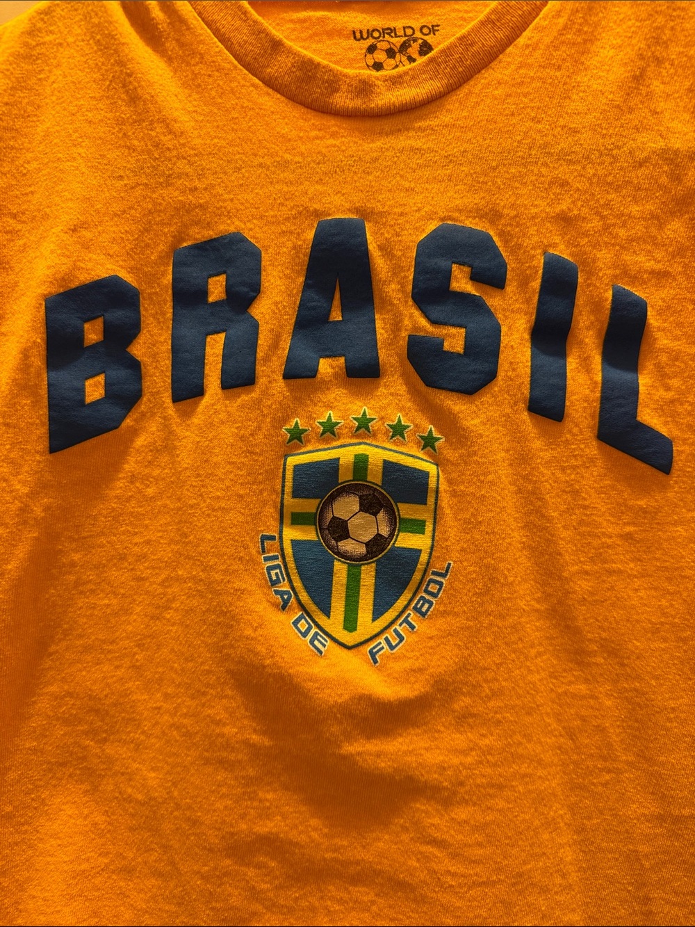 World of Soccer Brasil Liga de Futbol Yellow with Navy Kids Soccer Tee (S/8) - Picture 2 of 4